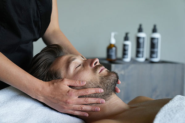Man enjoys a facial massage